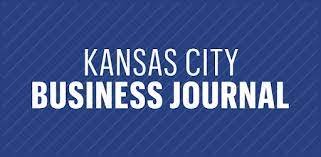 Blue box with Kansas city business journal logo in white